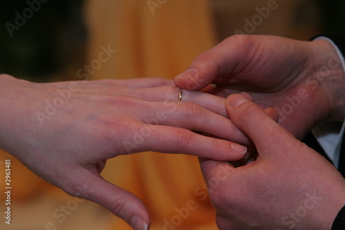 ring ceremony hands hold wedding