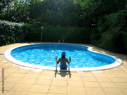 small girl in a pool