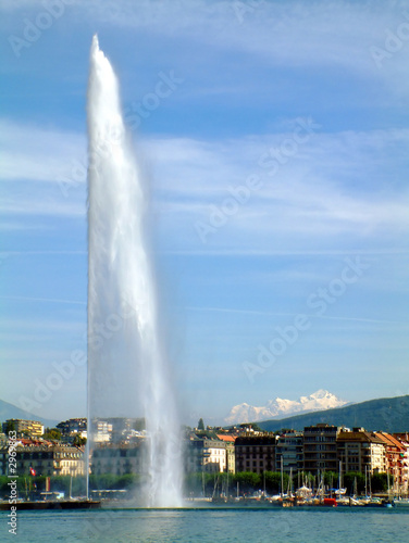 water fountain in switzerland with mont blanc