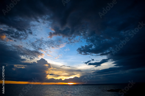 dark clouds above lake victoria photo