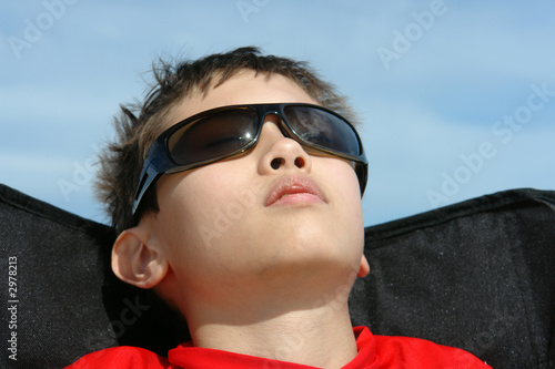 boy relaxing at beach