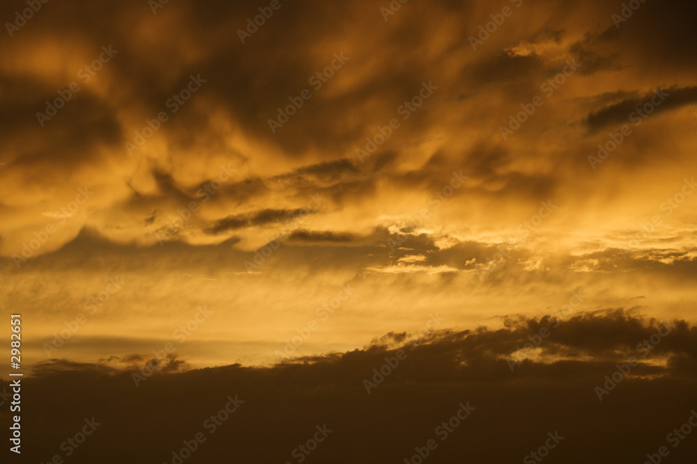 Golden sunset sky and clouds.