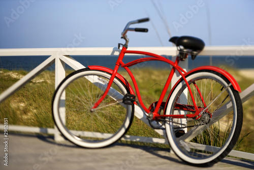 Bicycle leaning against rail on Bald Head Island, North Carolina
