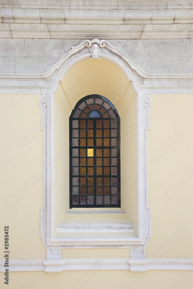 Window with colored panes in Lisbon, Portugal.