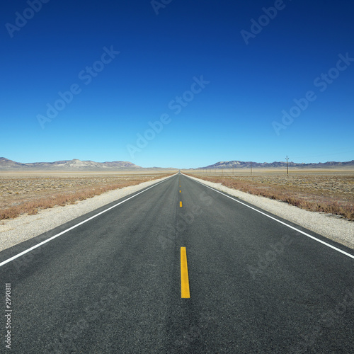 Highway stretching towards horizon. © iofoto