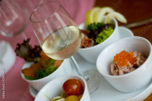 detailed appetizers with white wine