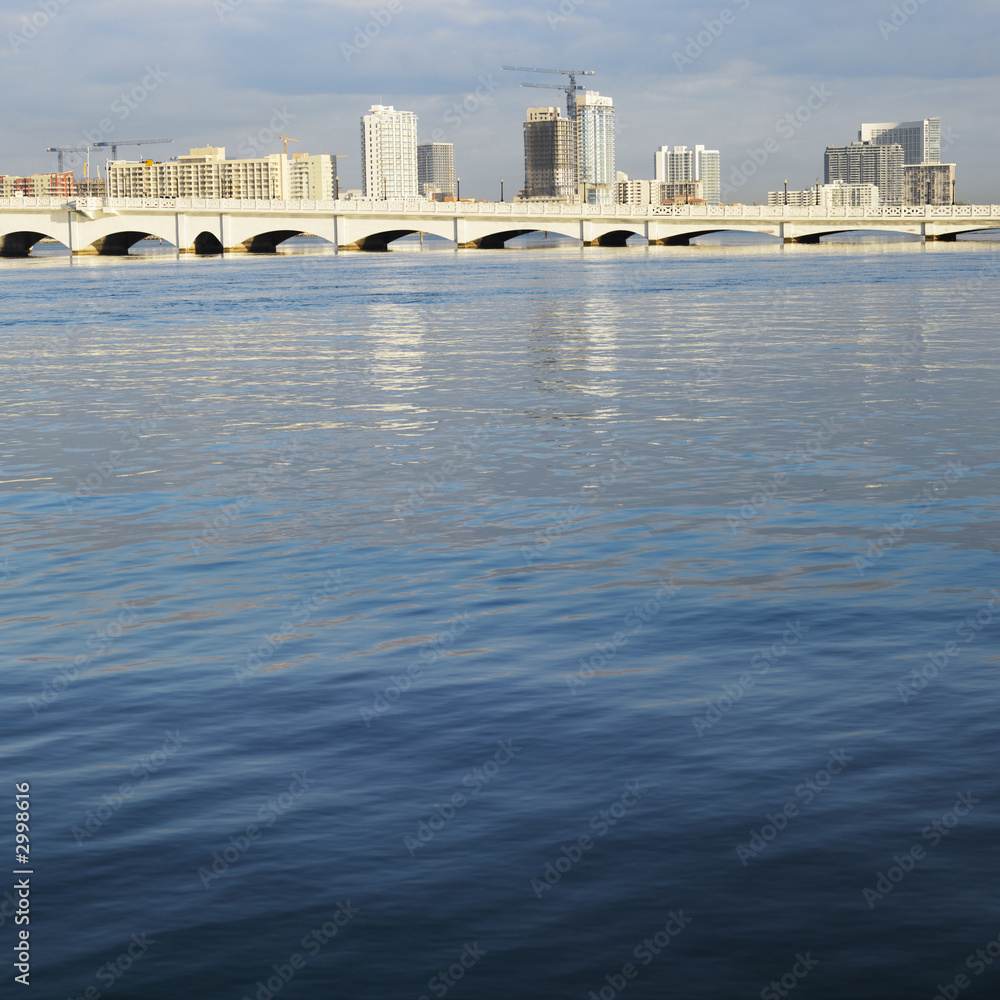 Waterfront skyline with bridge in Miami, Florida, USA. Waterfront skyline with bridge in Miami, Florida, USA.