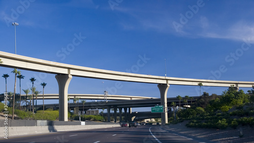 highway interchange above palms
