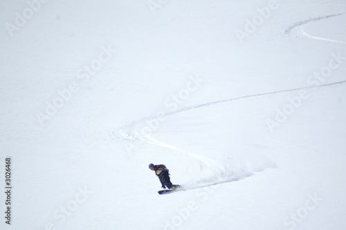 snowboarder on the snowfield photo