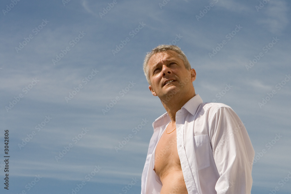 man against blue sky man against blue sky