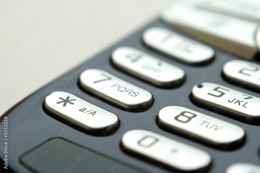 close up shot of mobile keypad under light close up shot of mobile keypad under light