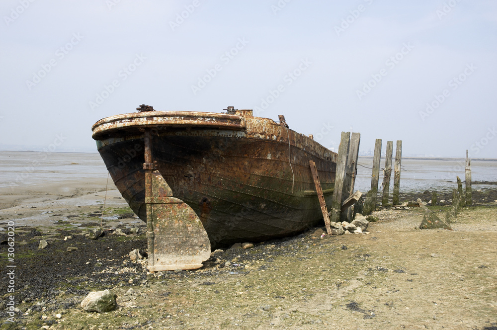 abandoned river barge