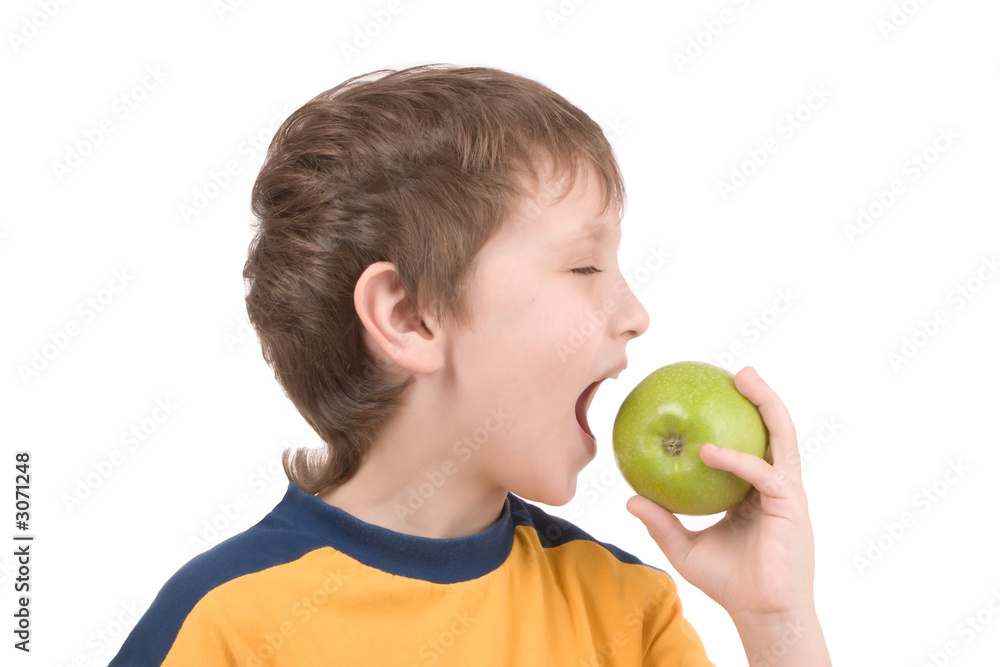 young boy eating apple young boy eating apple