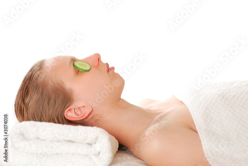woman laying on towel