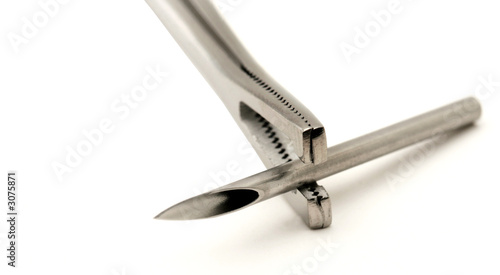 piercing needle and forceps