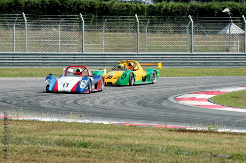 racing cars at a track