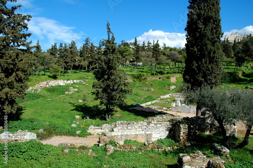 ruins of an ancient building around the acropolis