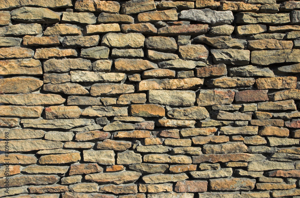 background: colorful stone wall