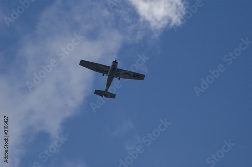 small airplane blue sky