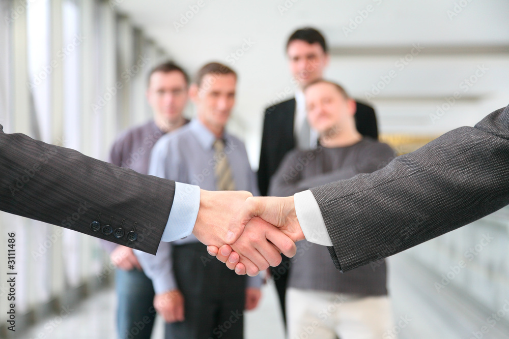 shaking hands and business team 2 shaking hands and business team 2