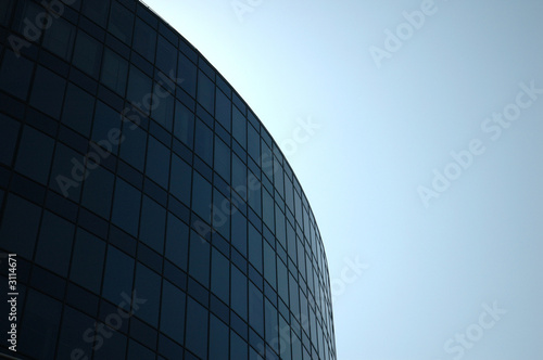 modern building fades into blue sky