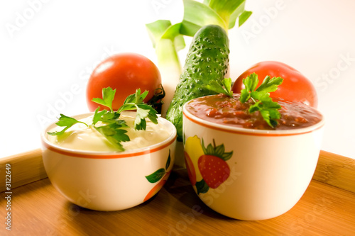 ketchup and mayonnaise over wooden background