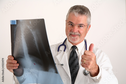 Wallpaper Mural doctor with x-ray giving the thumbs up sign Torontodigital.ca