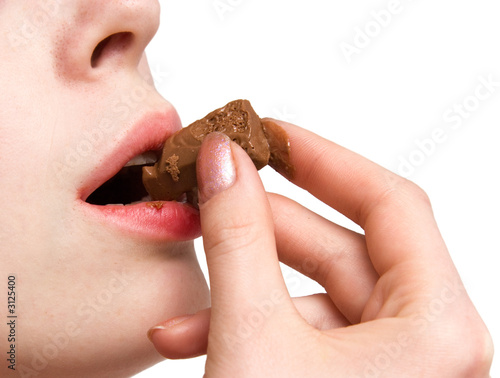 girl eating chocolate © chaossart