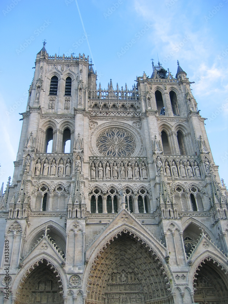 front view of the cathedral with blue sky, amiens, france