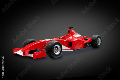 red formula one car in black background