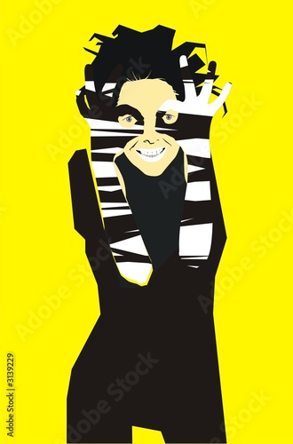 girl with glasses made fom her hands and yellow ba