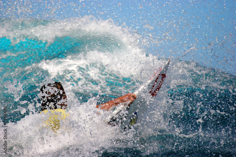 Naklejka premium surfeur teahupoo