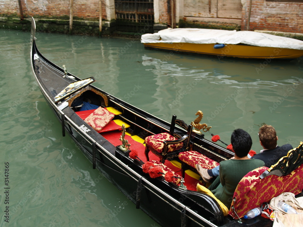 couple in the venetian gondola