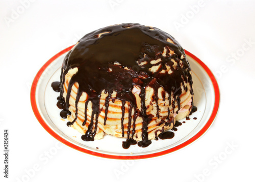 Sponge cake with chocolate and jam and almond photo