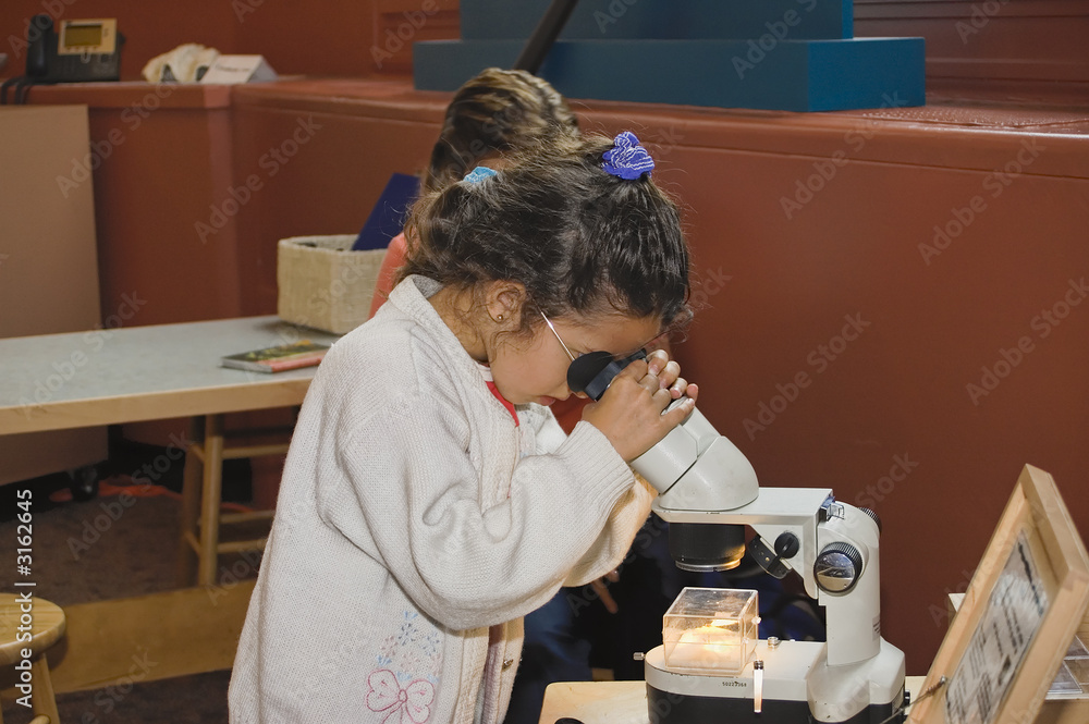child with microscope child with microscope