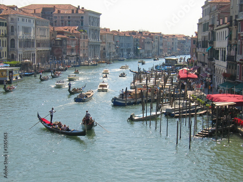 condolas on a the main water canal, venice, italia photo