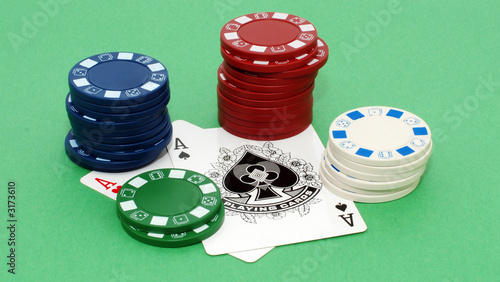 poker chips and aces