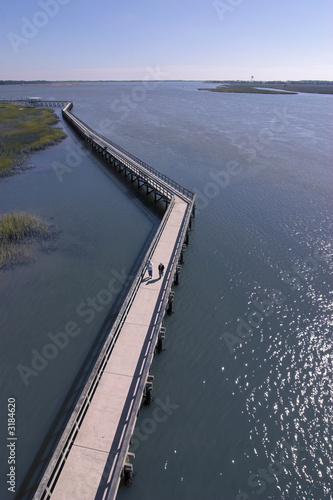 aerial view of couple on boardwalk © Wollwerth Imagery