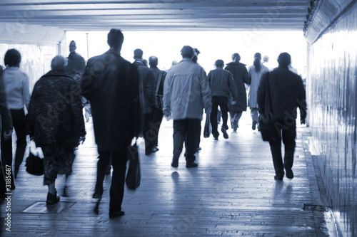 going people in a subway