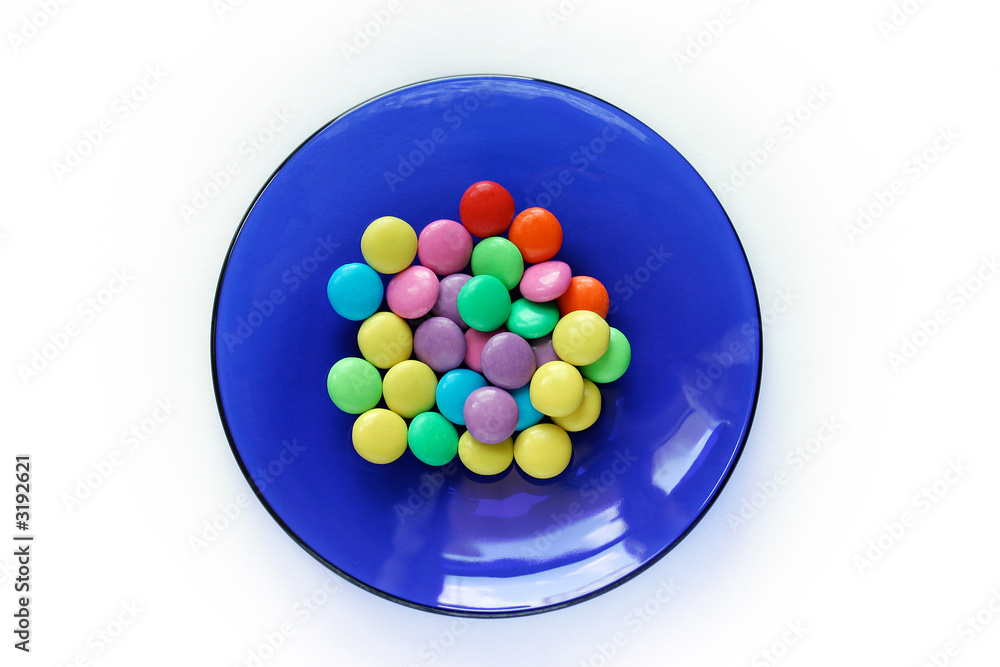 multi-coloured goodies on blue plate