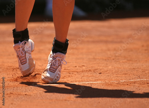 legs at the tennis court