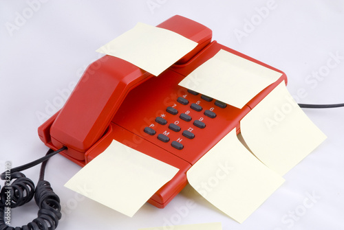 red telehone with memo photo