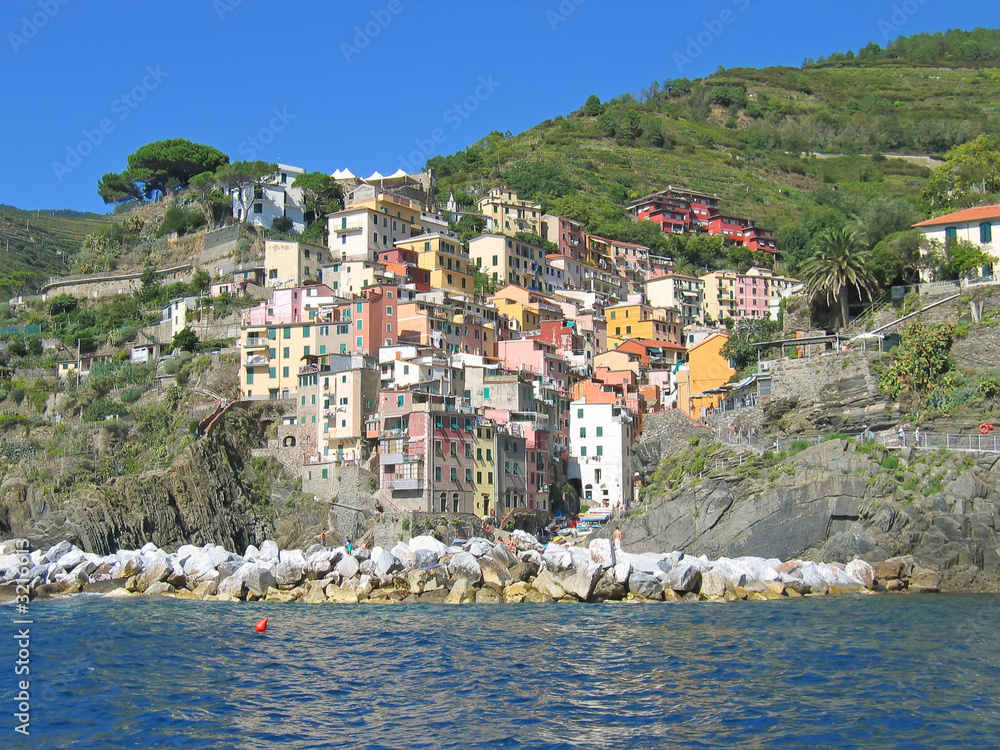 manarola coloured village from the sea, the cinque terre, italia
