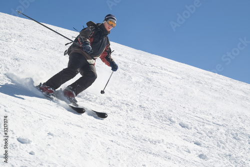 Wallpaper Mural skier with ski pole on snow and blue sky Torontodigital.ca