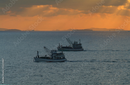 fishing boats at sunrise © Thor Jorgen Udvang