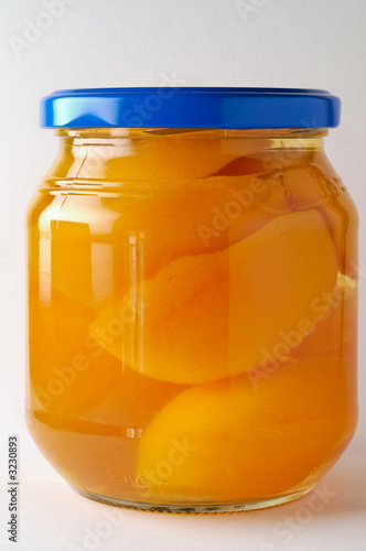 glass jar of prerserved peachers (1)