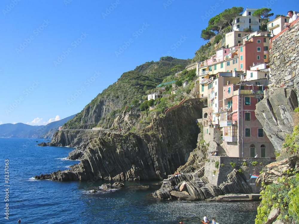 riomaggiore village on the top of a stone cliff, the cinque terr
