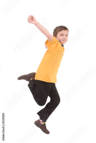 young boy jumping up