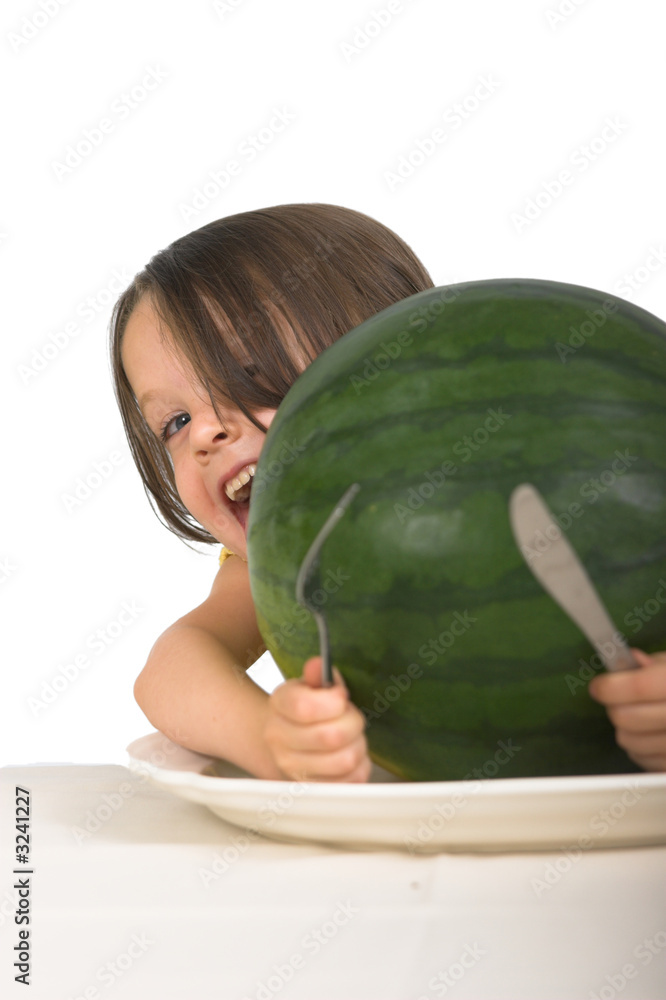Fototapeta premium little girl with plate of watermelon