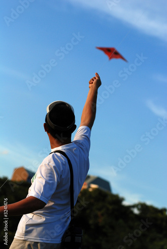 a man flying a kite © Wong Hock Weng